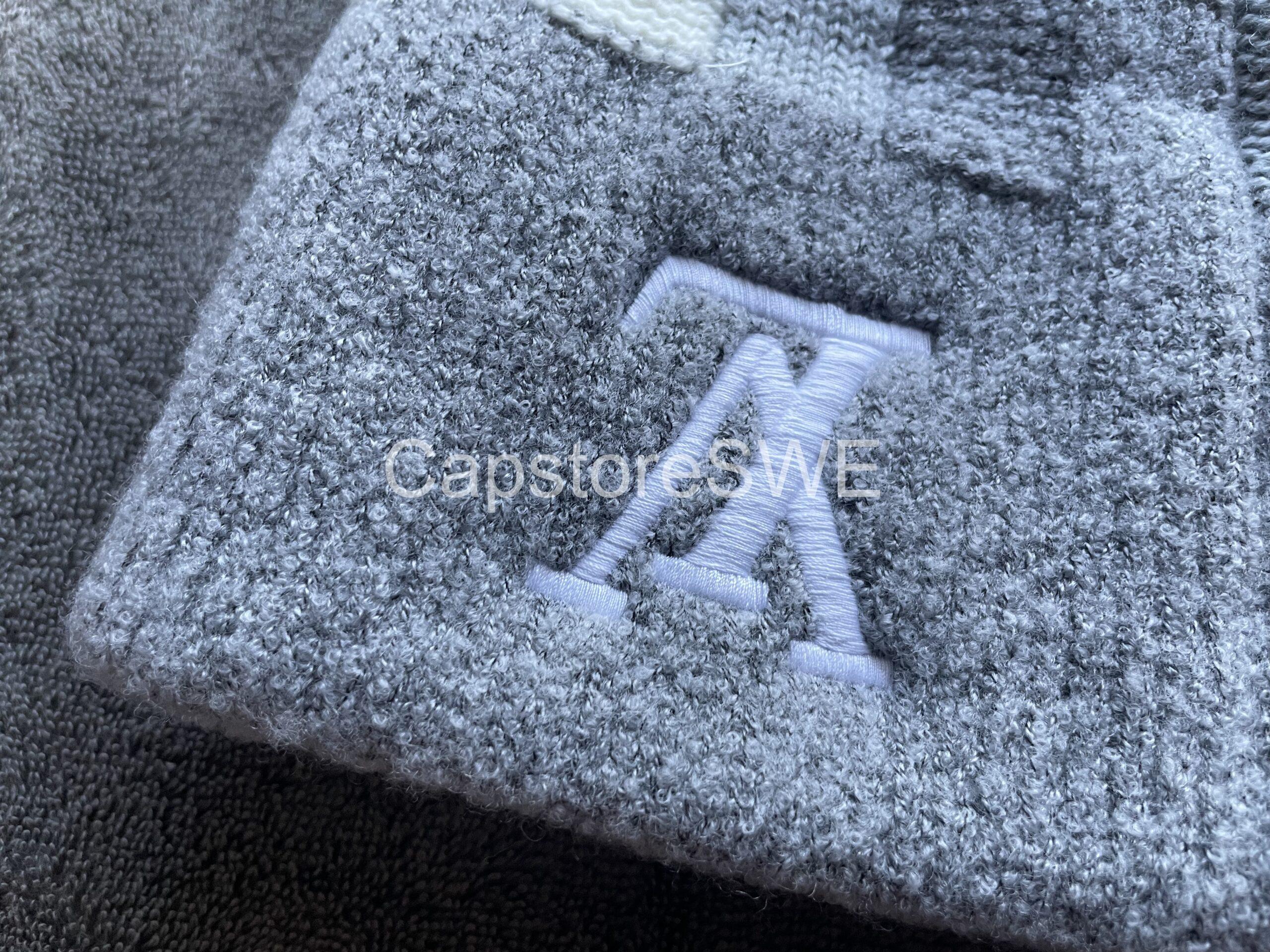 louis vuitton damier knit beanie with pearl lv logo – grey/white louis vuitton damier knit beanie with pearl lv logo – grey/white